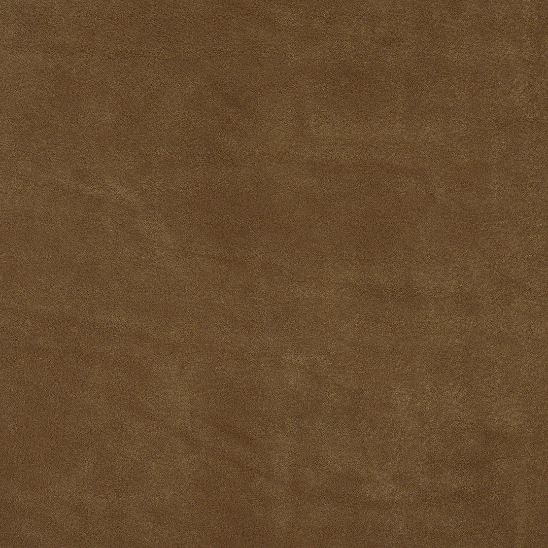 Close-up of camel brown suede leather texture with smooth, soft finish