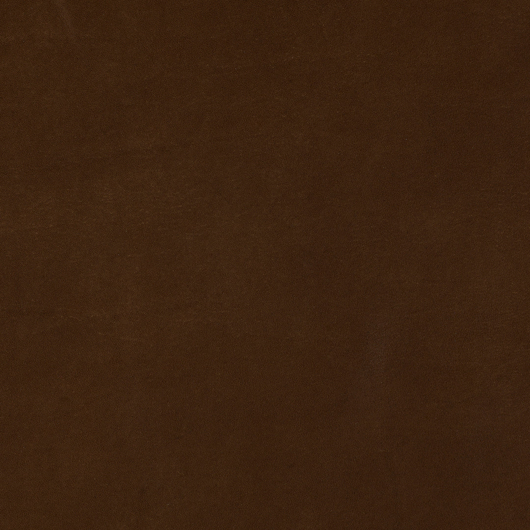 Close-up texture of rich chocolate brown leather with smooth surface