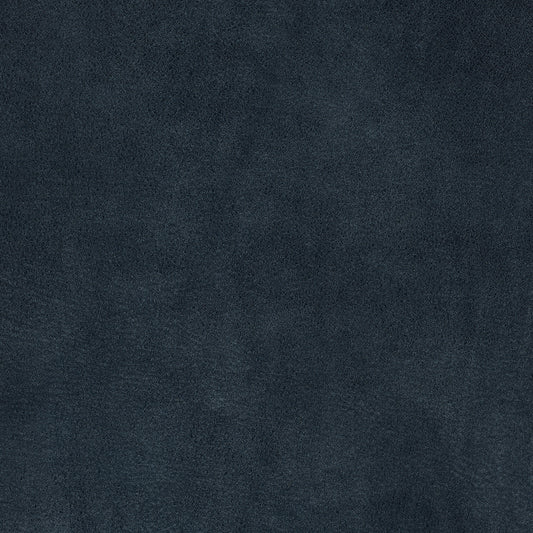 Close-up texture of royal blue suede fabric showing soft, velvety surface detail