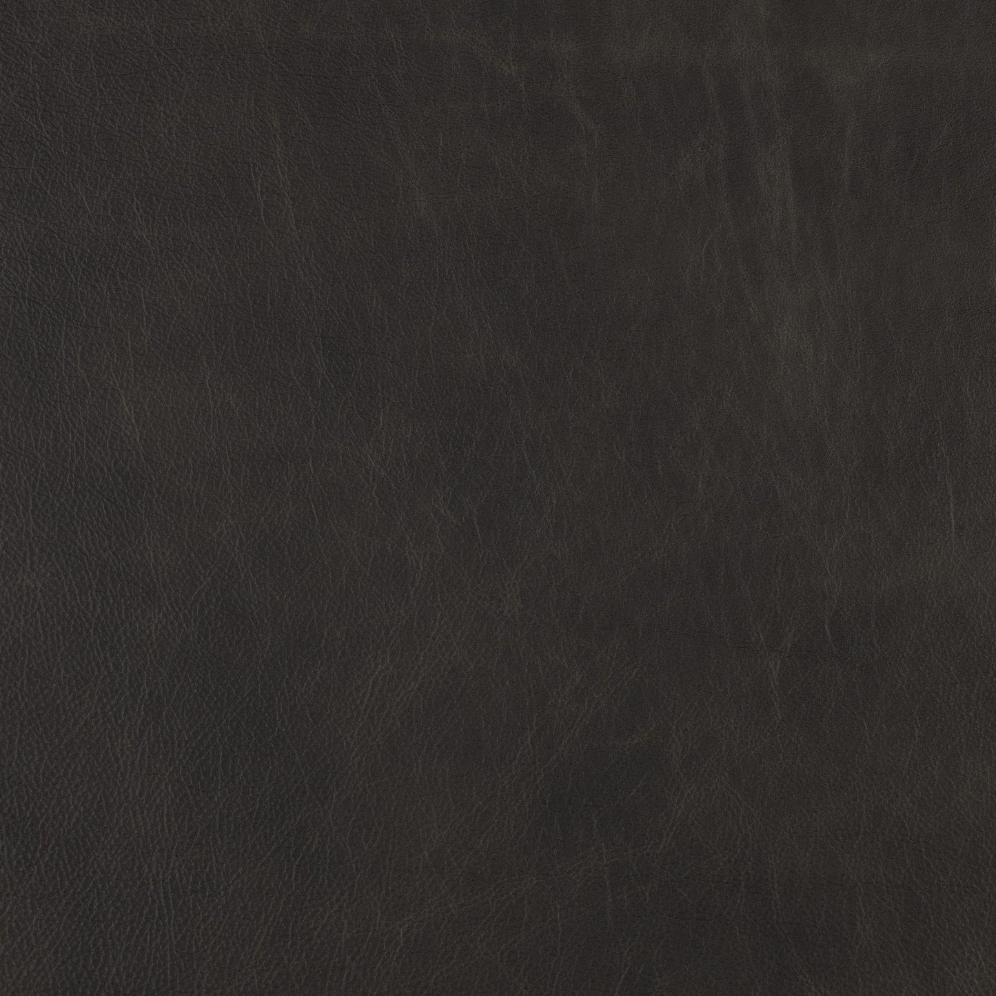 Close-up of dark grey distressed leather texture with subtle wrinkles and natural grain