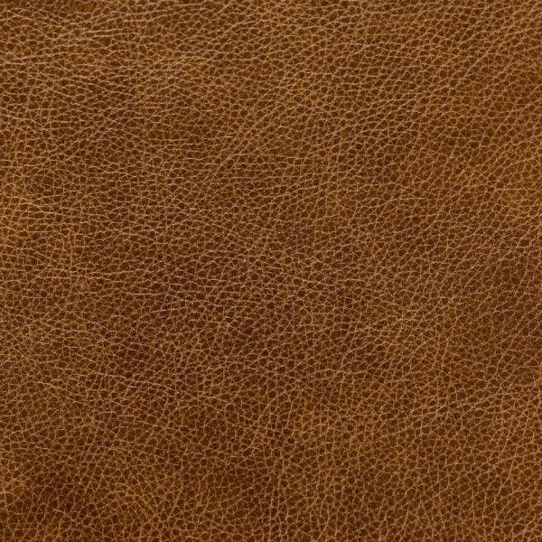 Close-up of brown textured leather material from Asher Leather